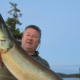 Photo of Todd holding a Muskie